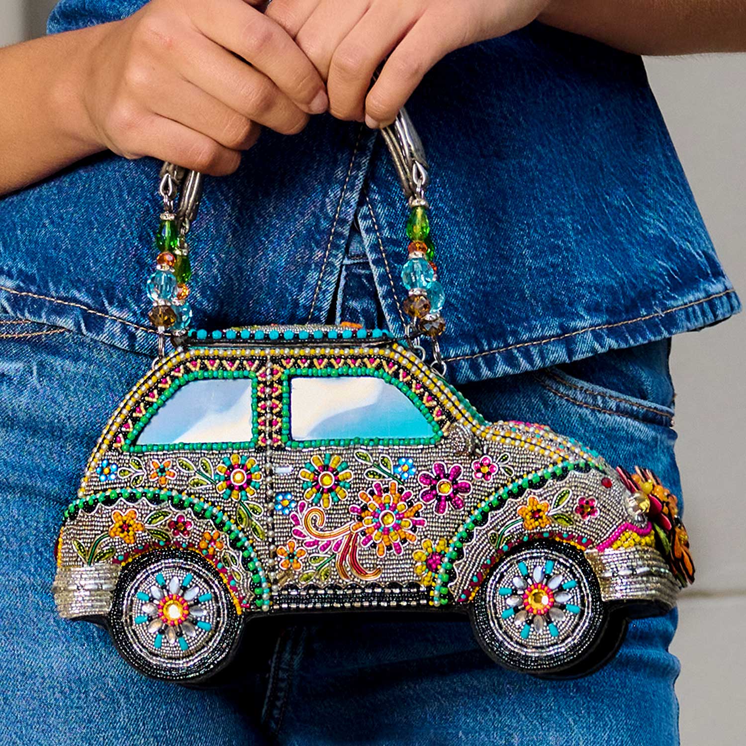 Model holding Sunny Drive Beaded Car Shape Novelty Top Handle Bag Purse