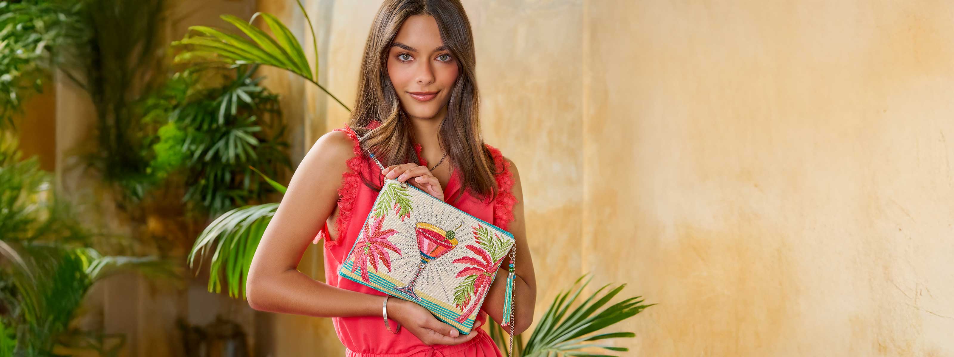 Model holding Palm Paradise Beaded Tropical Cocktail Crossbody Clutch Handbag