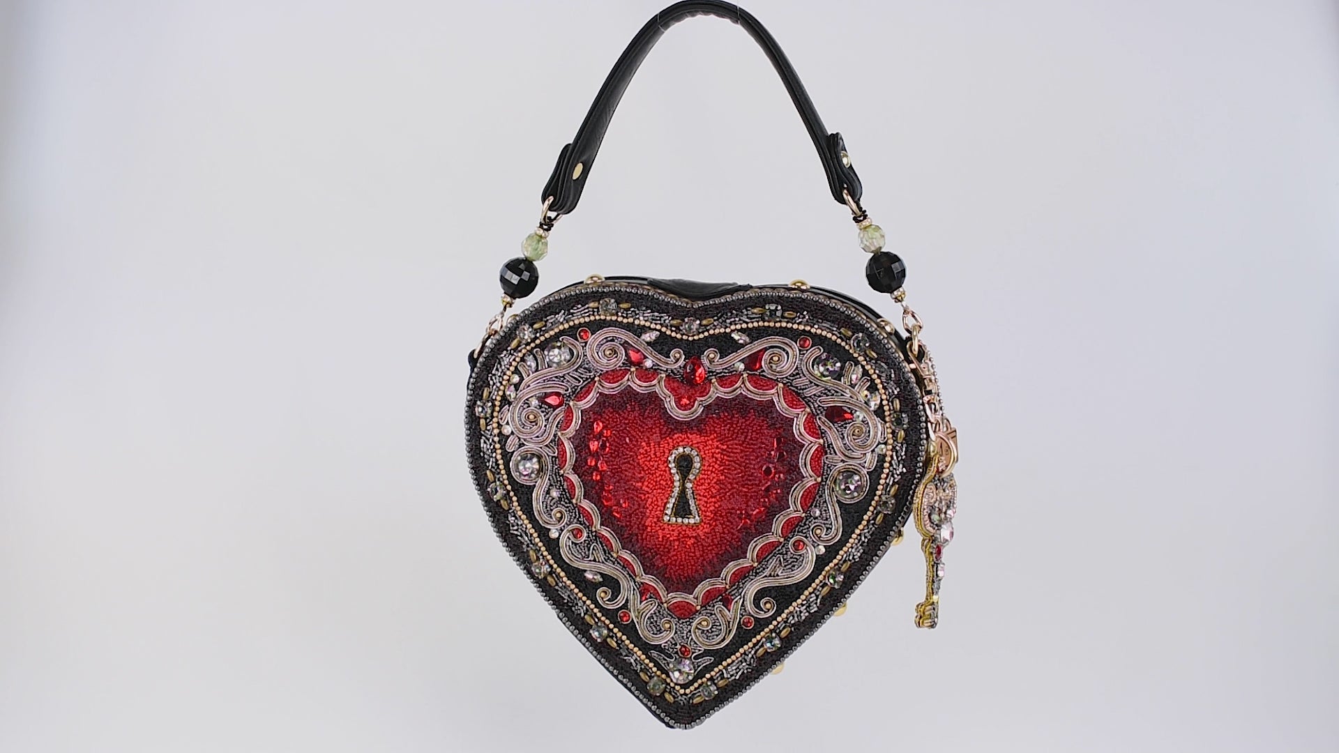 Embrace beaded heart locket and key shaped handbag video showing all sides