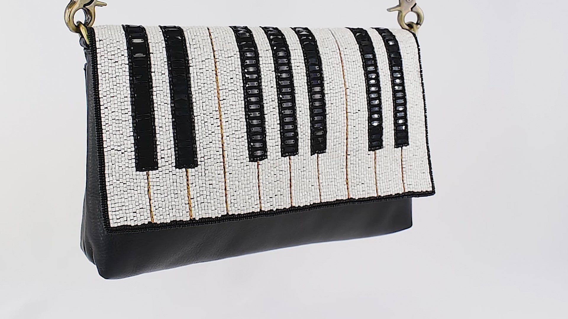 Keynote beaded leather piano keyboard handbag video showing all sides